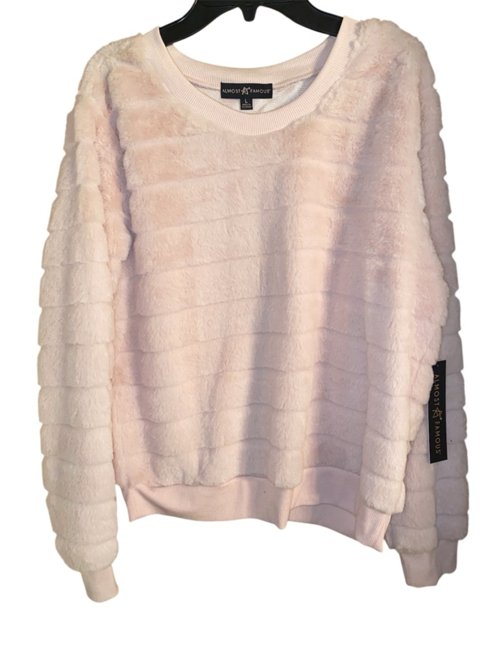 Almost Famous pink faux-fur ssweatshirt with a ribbed crew neckline. NWT SZ L
